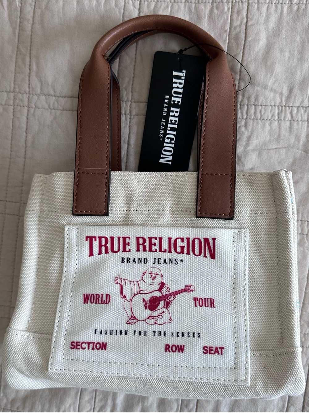 True Religion Cream Canvas Tote with Brown Handles and Pink Logo
